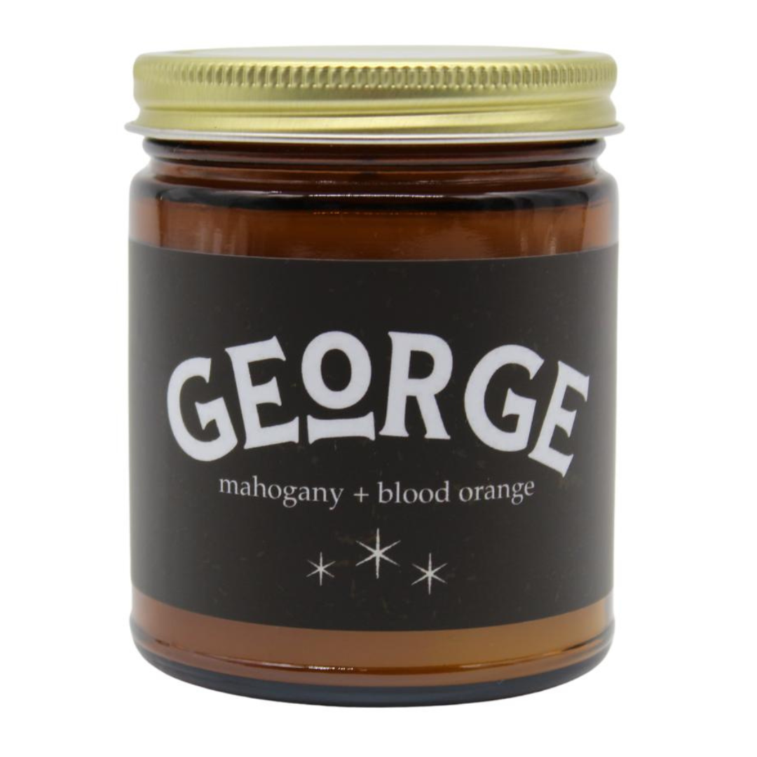 'GEORGE' candle scented mahogany and blood orange, in amber glass with lid. 