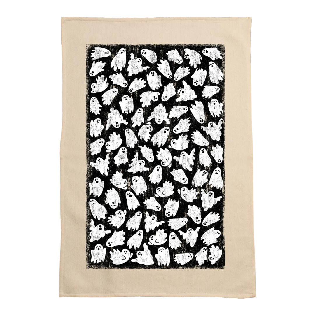 Kitchen towel with friendly ghosts screen printed in black and white. 
