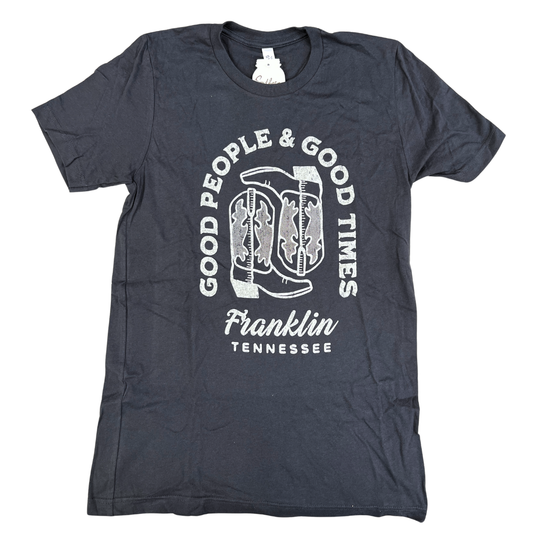 Dark grey shirt says, "Good People Good Times Nashville Tennessee" with cowboy boots printed in cream. 
