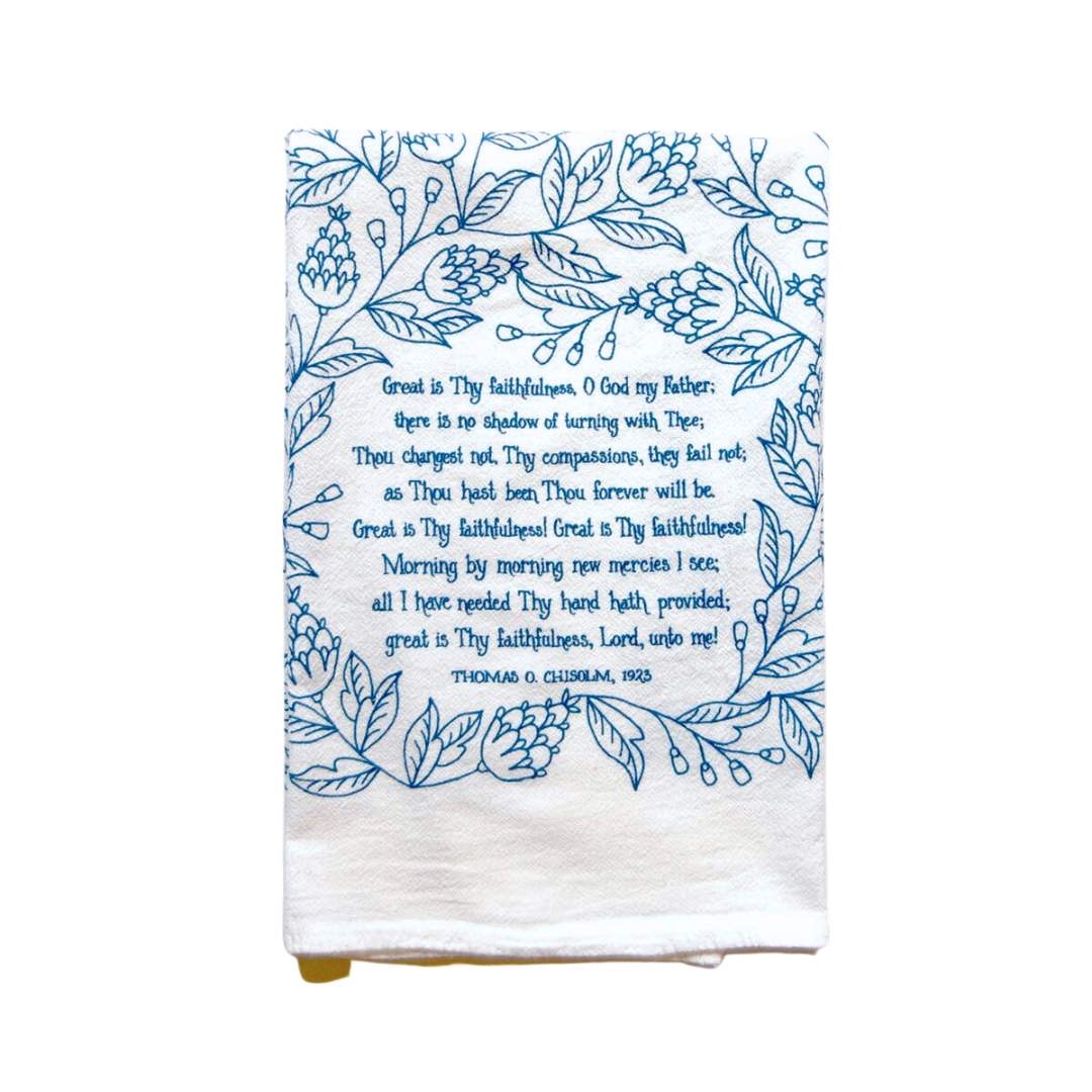 Chorus from hymn "Great is Thy Faithfulness" on white cotton towel with bright blue floral pattern. 