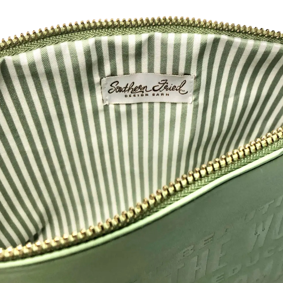 green faux leather catch all pouch, lined with zipper.