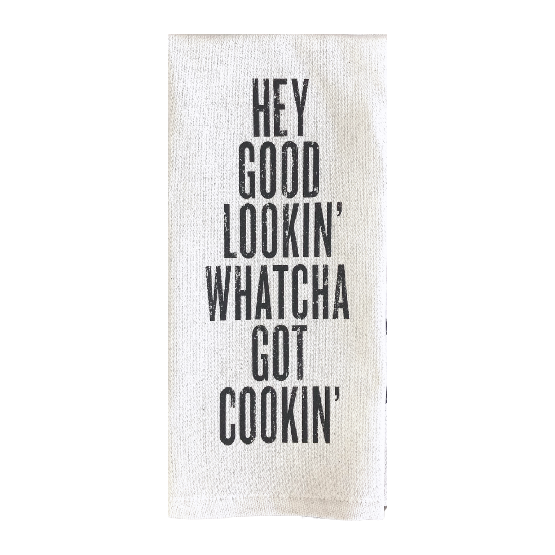screen printed on cotton kitchen towel in black, "Hey good lookin' whatcha got cookin'"