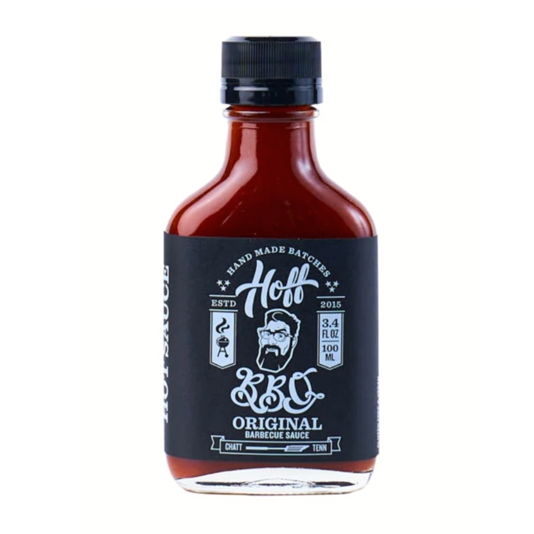 3.4 oz glass bottle of bbq sauce with black label.