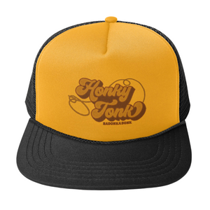 Black and gold foamy trucker hat with mesh sides that says "honky tonk badonkadonk"