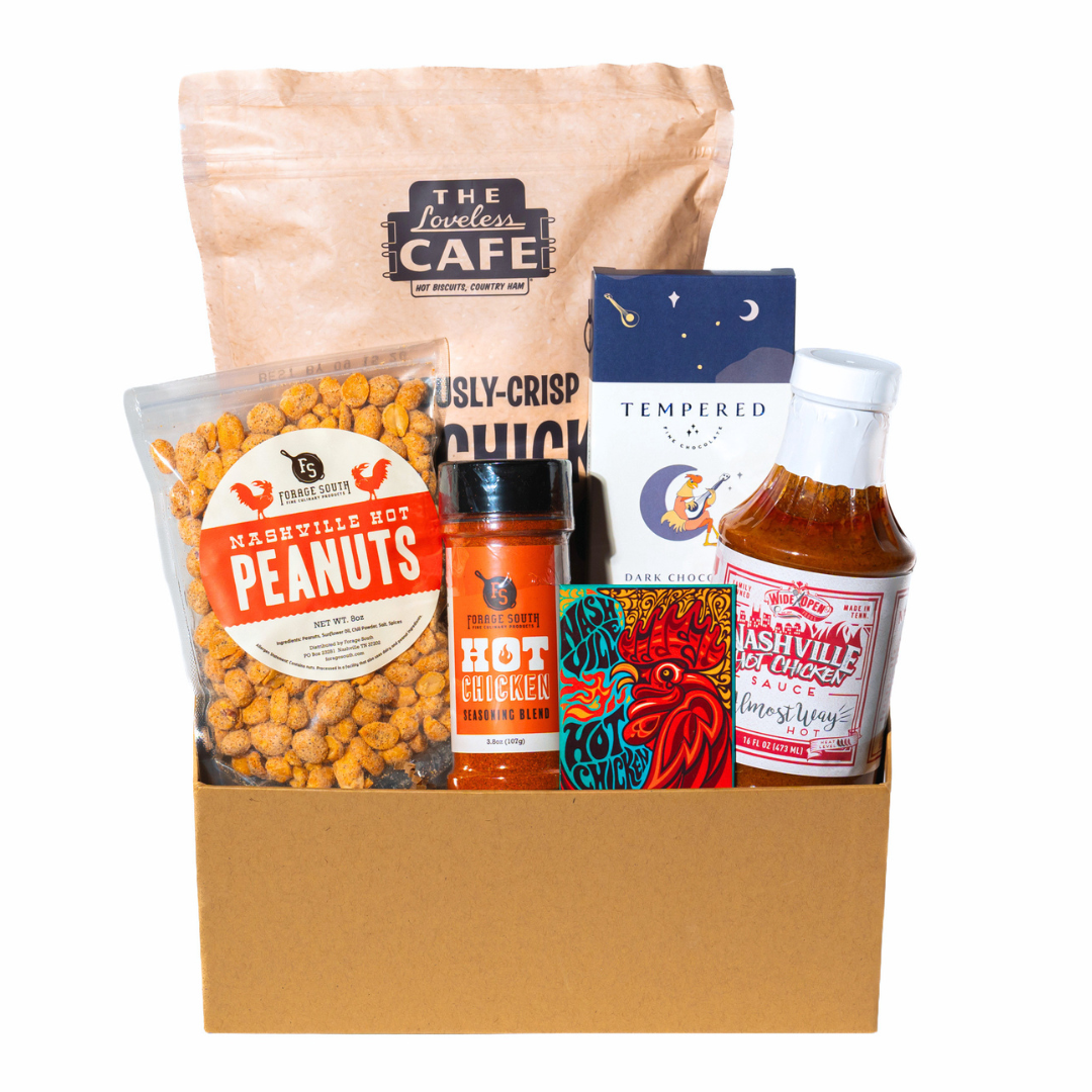 collection of nashville hot chicken themed items and chicken breading, seasoning and hot sauce.  