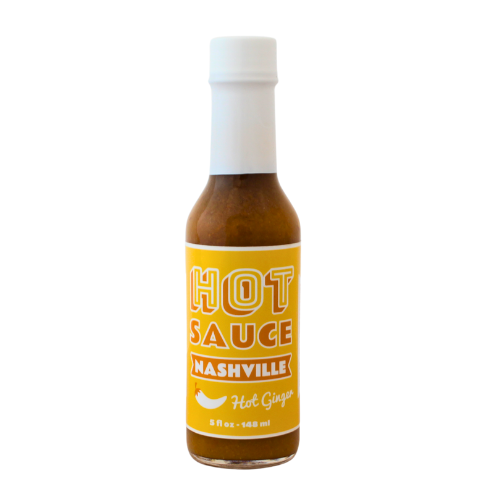 5 floz of hot ginger hot sauce in glass bottle.