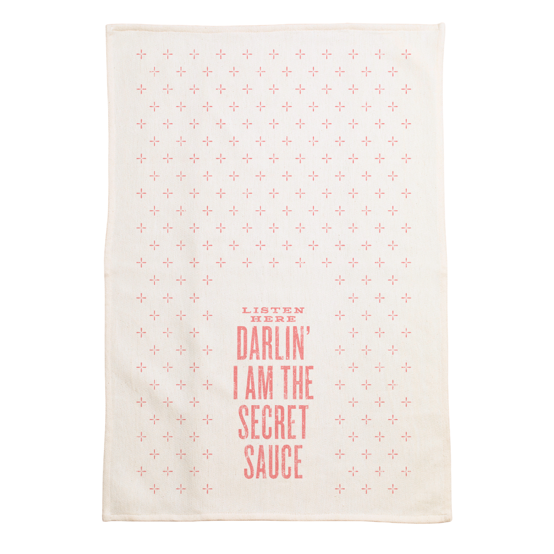 screen printed on cotton kitchen towel in pink "I am the secret sauce"