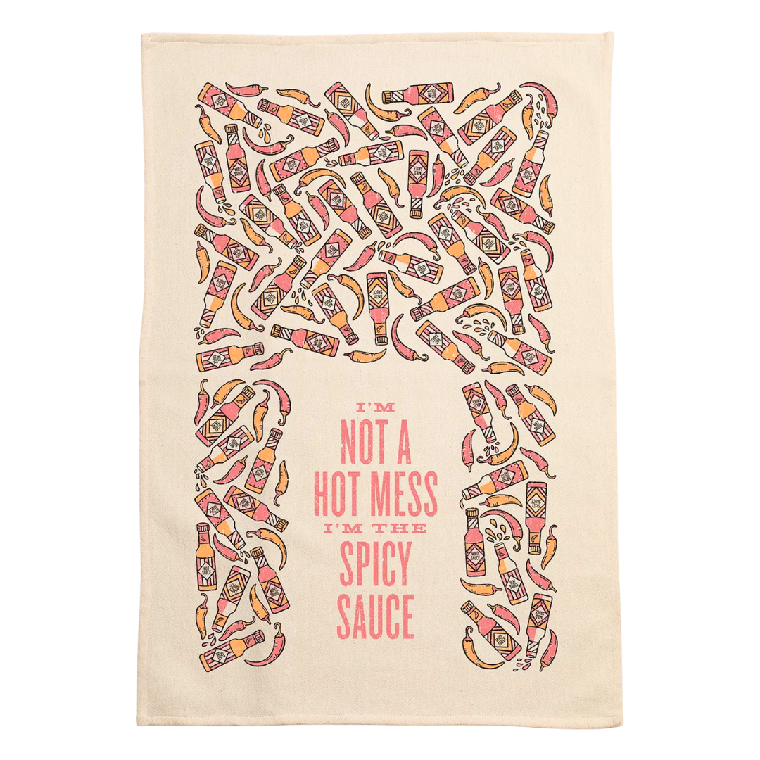 screen printed on cotton kitchen towel in pink and yellow, "I'm not a hot mess i'm the spicy sauce"