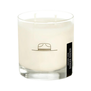 8 oz leather and pine scented candle.  In reusable rocks glass.