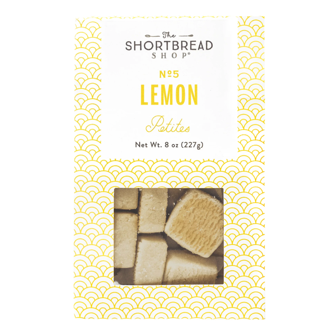 yellow and white box of lemon petite shortbread bites. 