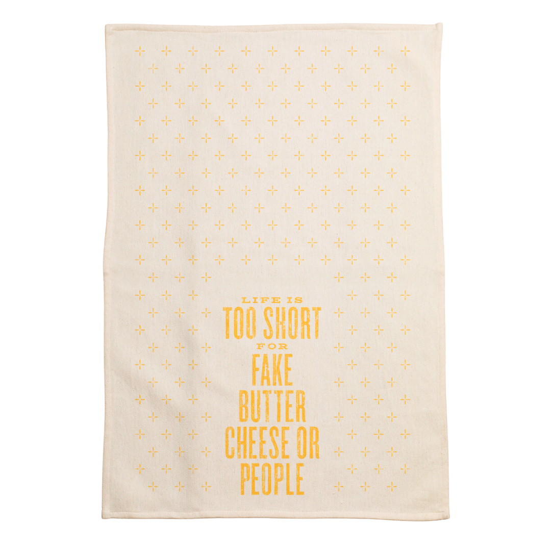 funny saying screen printed on cotton kitchen towel in yellow. 