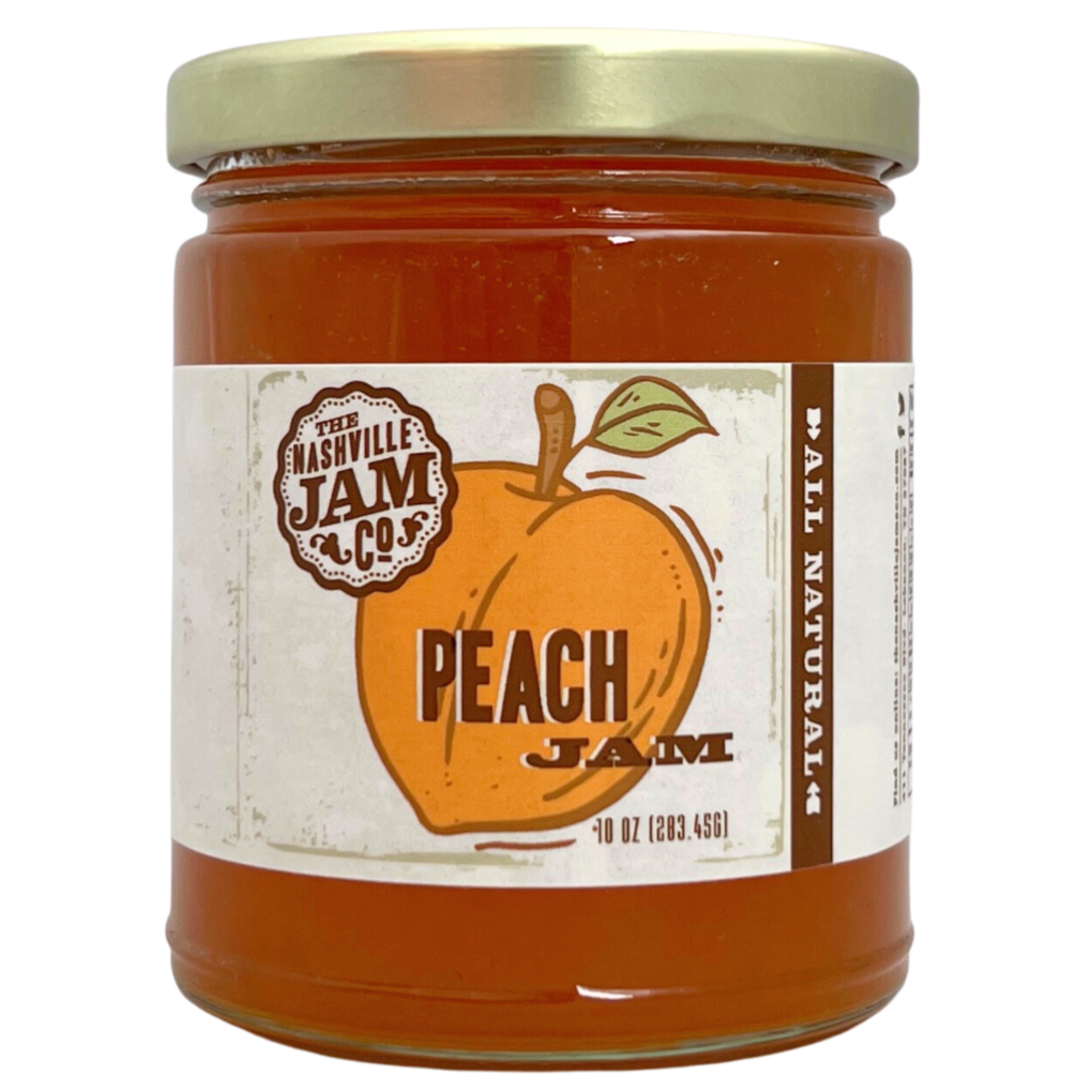 Peach jam in 10 oz clear glass jar with gold lid. 