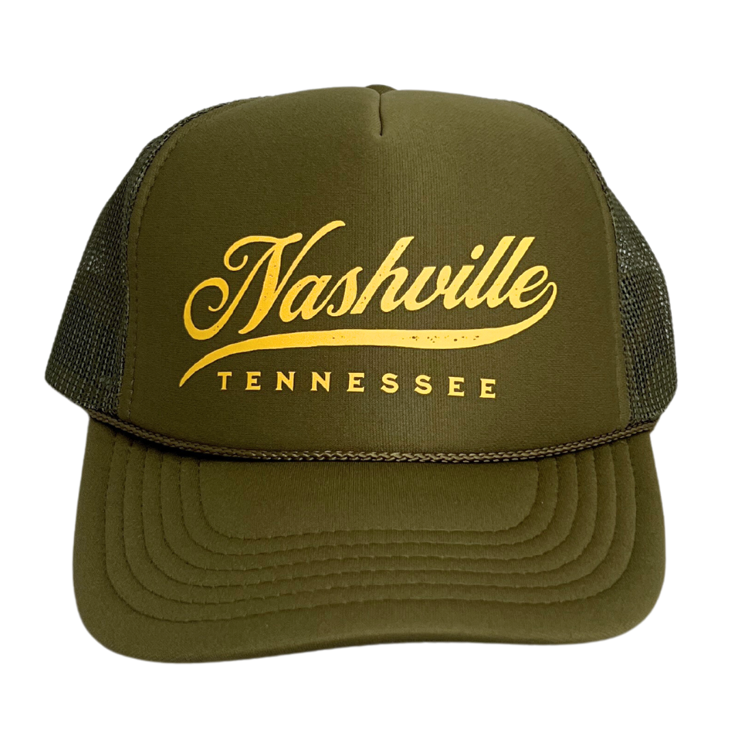 Army green trucker hat with foamy front and mesh sides; says "Nashville, Tennessee" in gold.