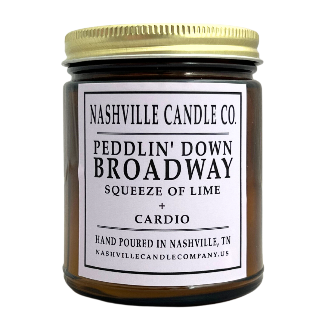 Nashville Candle Company presents the "Peddlin' Down Broadway" that features a scent of lime. Capture those good vibes at home. 9 oz. Made in Nashville, Tennessee.