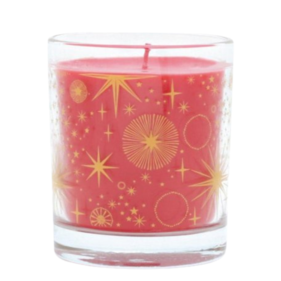 Red candle in a glass jar with gold starbursts.