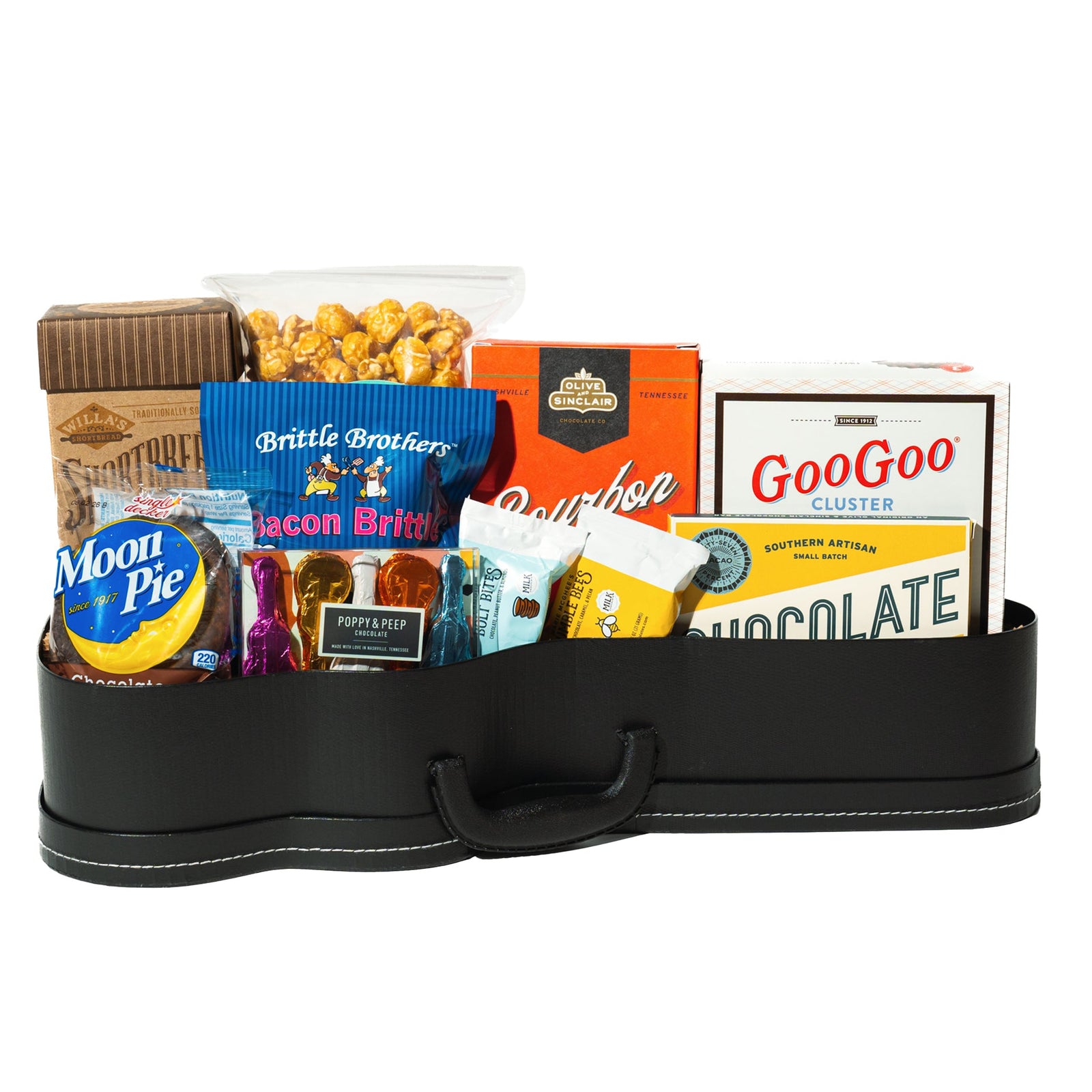 Collection of Tennessee snacks and chocolates assembled in a guitar shaped gift box. 