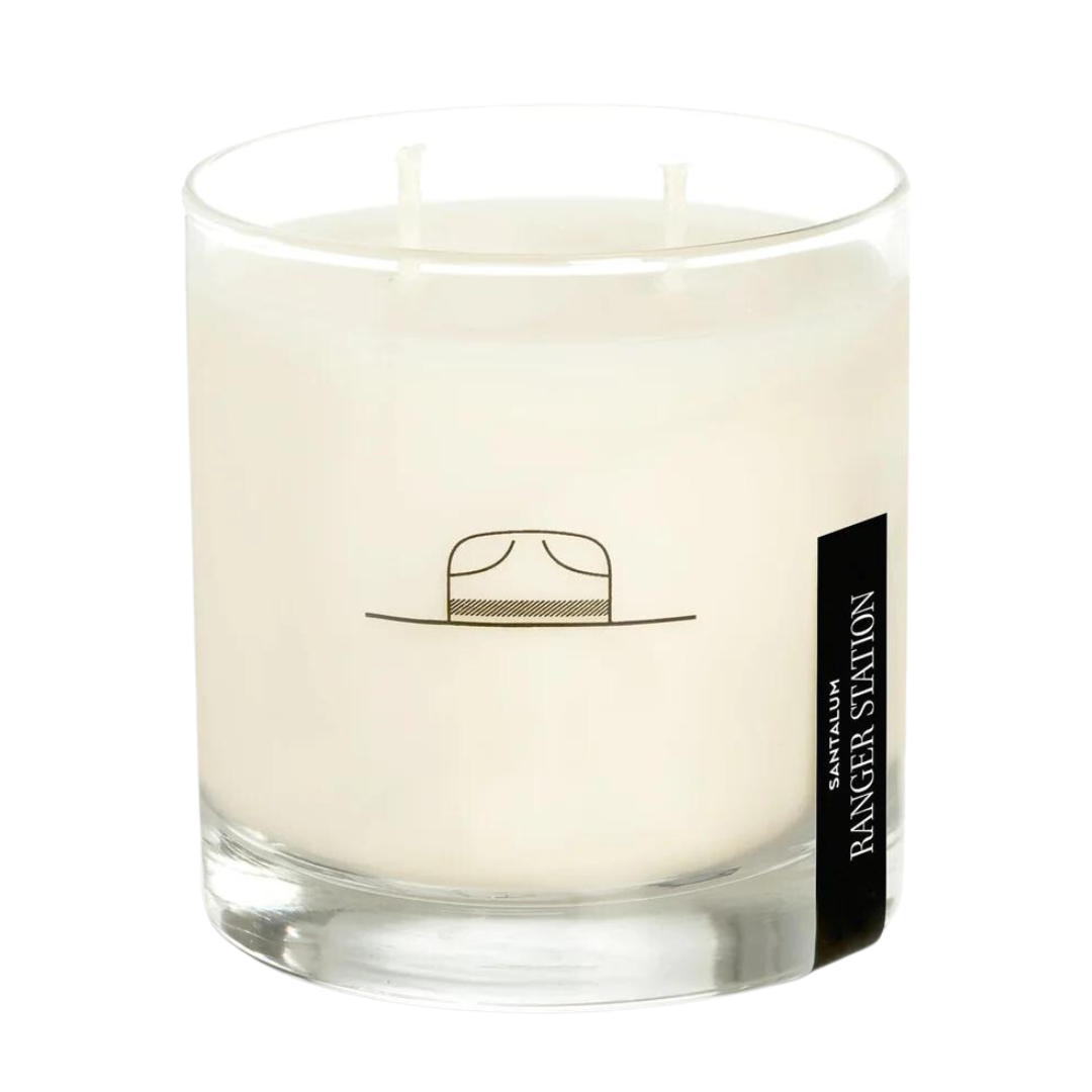 8 oz Santalum candle sandalwood, amber resin, iris, and leather. In reusable rocks glass. 