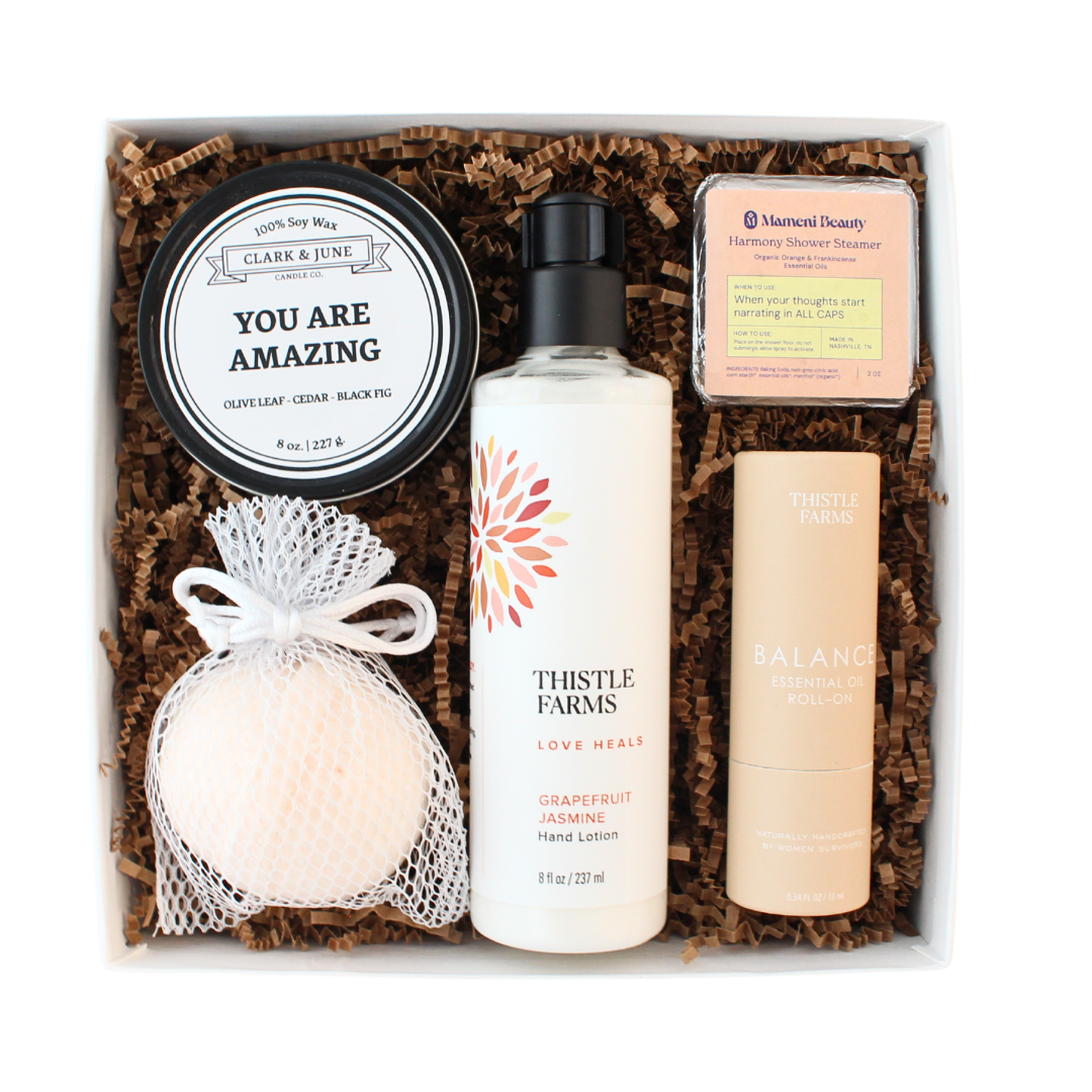 "You are amaizing" candle in a citrus themed self care gift box.  