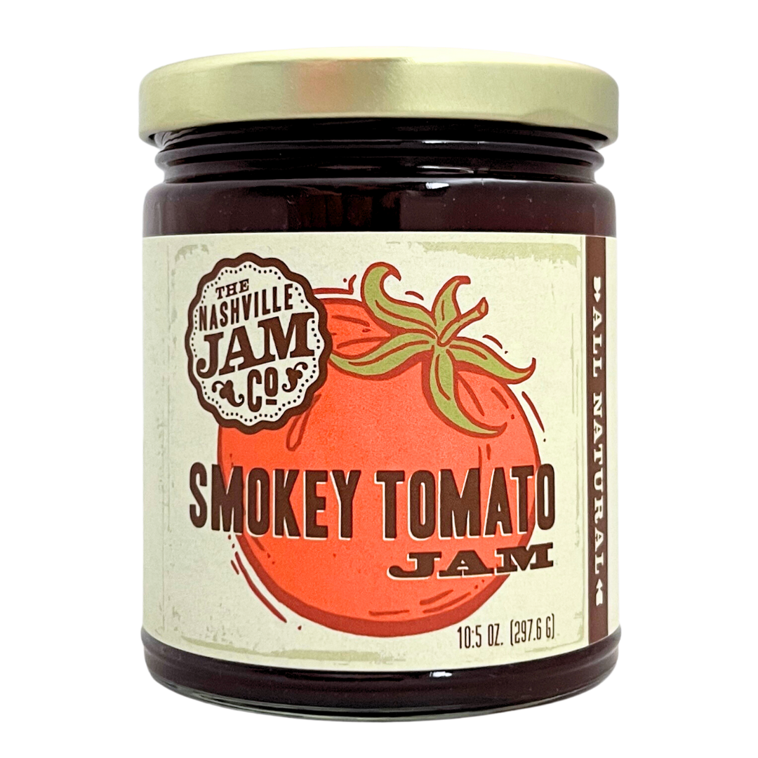 Tomato jam in 10 oz clear glass jar with gold lid.