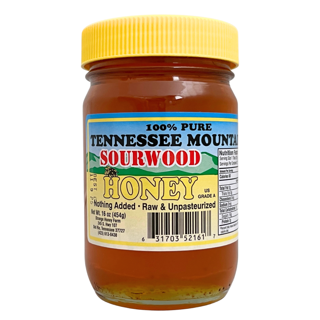 Clear jar of honey with a yellow ribbed lid. Has label of Sourwood Honey.