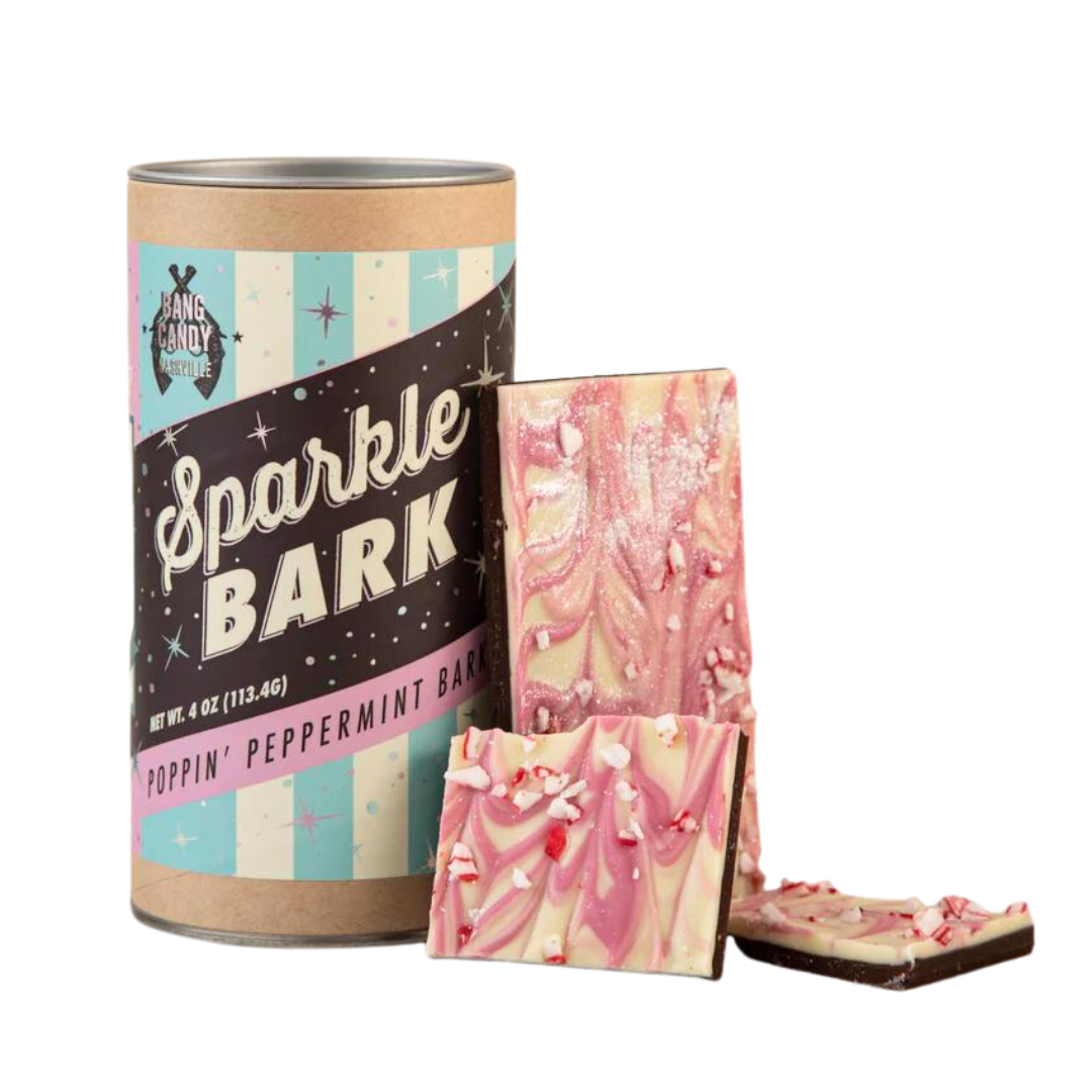 Sparkle Bark in a foil and cardboard can. The label has sparkly white and baby blue stripes with "Sparkle Bark" in fancy fonts. 