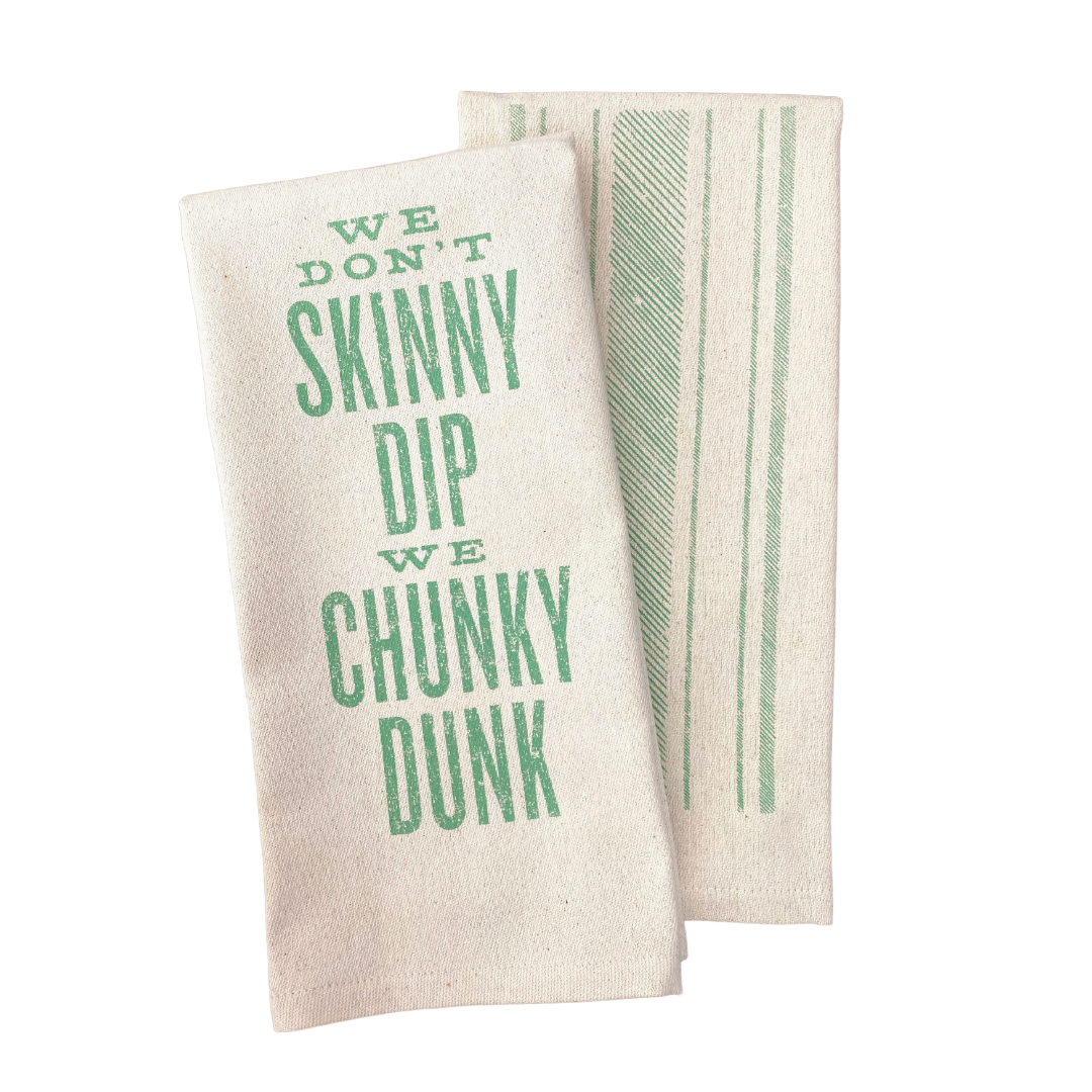 screen printed on cotton kitchen towel in green, "we don't skinny dip we chunky dunk"
