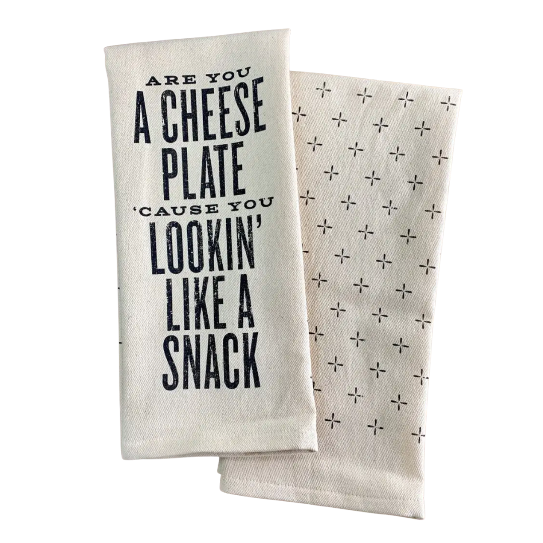 screen printed on cotton kitchen towel in black, "are you a cheese plate, 'cause you lookin' like a snack"