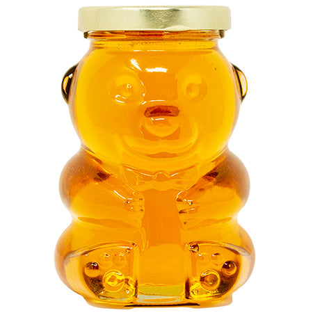 Golf honey bear glass container. Comes with secure lid.
