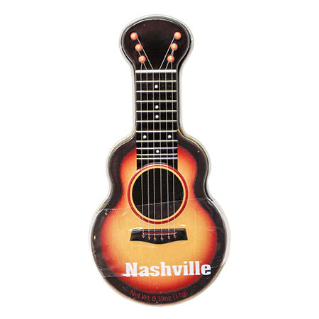 Guitar shaped tin with mini peppermints, says "nashville" guitars come in assorted colors. 