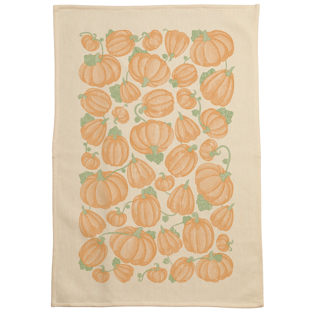 Kitchen towel screen printed with fall pumpkin vines.