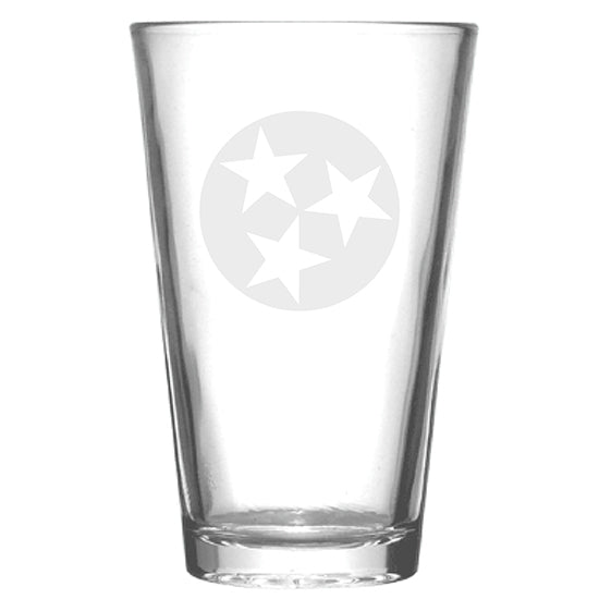 Tristar emblem frosted on a clear drinking glass. 