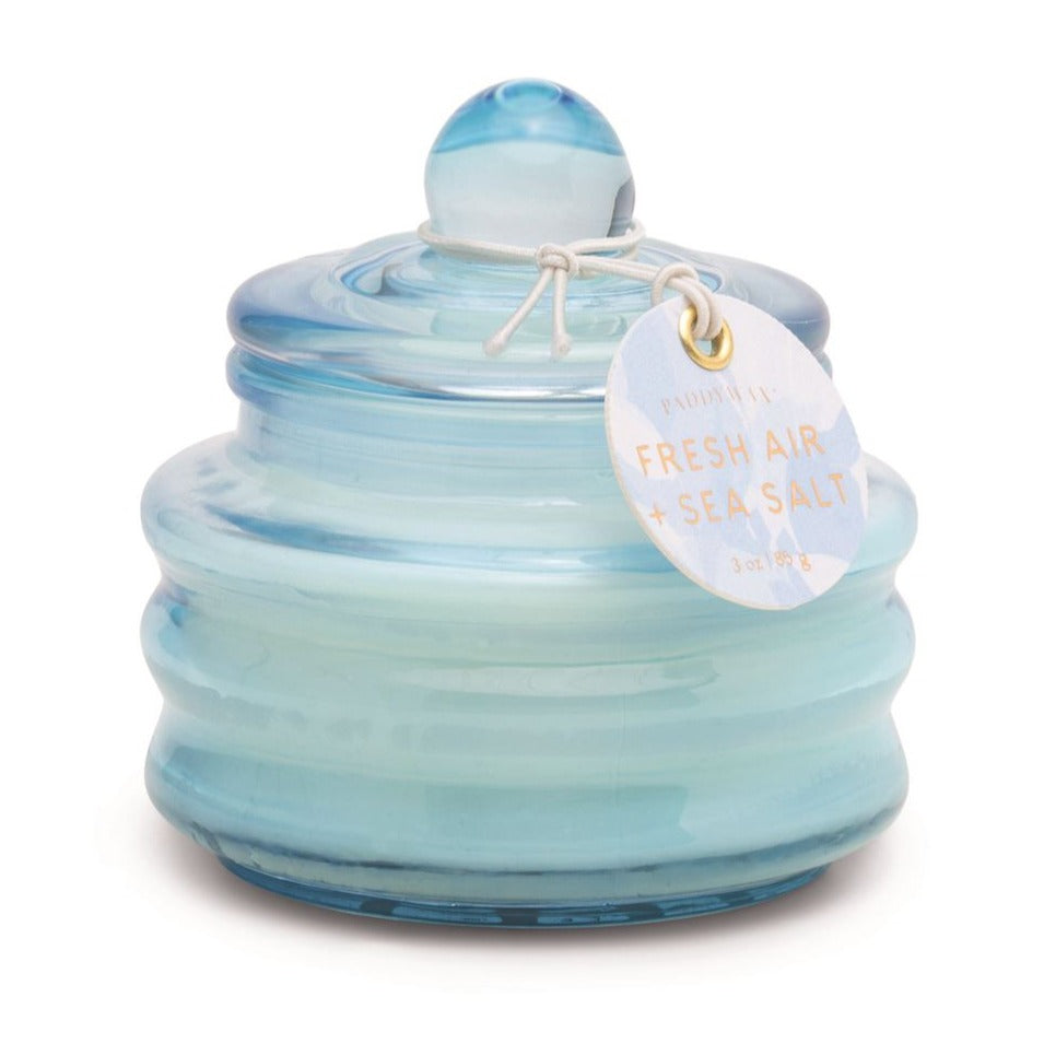 "Fresh air and sea salt" candle from Paddywax! Comes in a small glass trinket holder. 3 oz. Easy for travel and use. Hand-poured in Nashville, Tennessee.