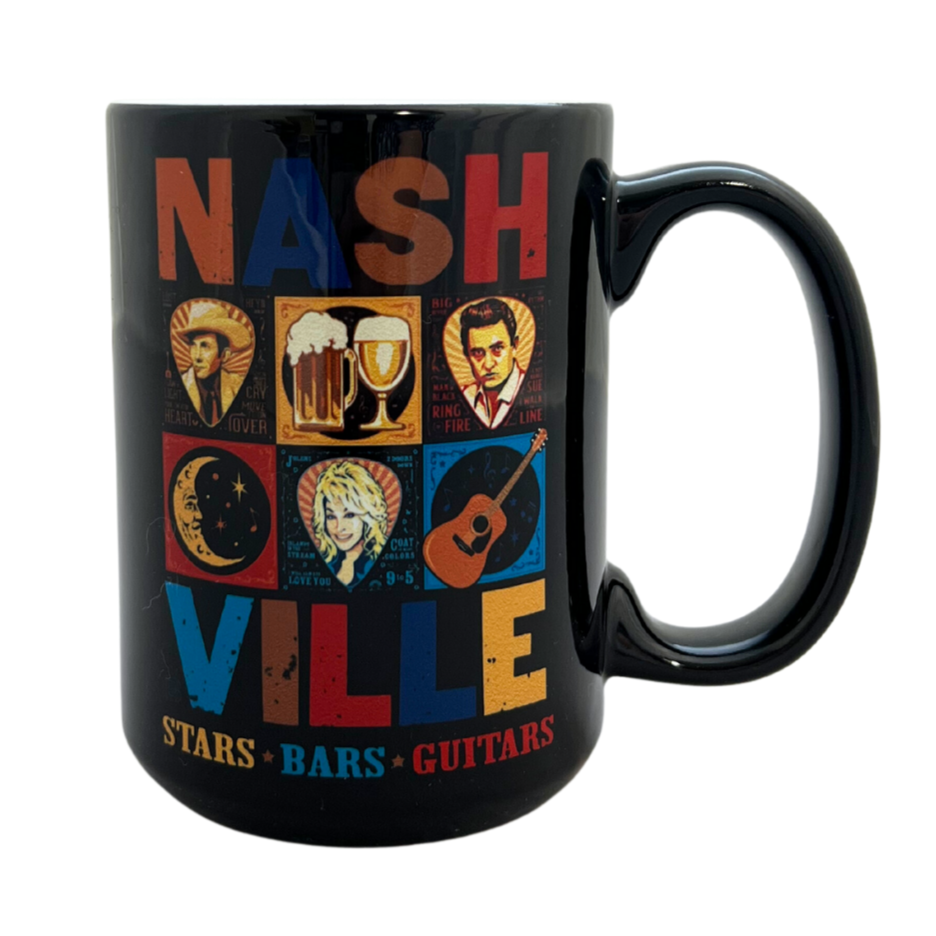 Stars and Guitars mug. Features photos of Johnny Cash and Dolly parton along with some other pieces of Nashville iconography. Black mug with a variety of colors in the design. Says "Stars. Bars. Guitars," on the bottom.